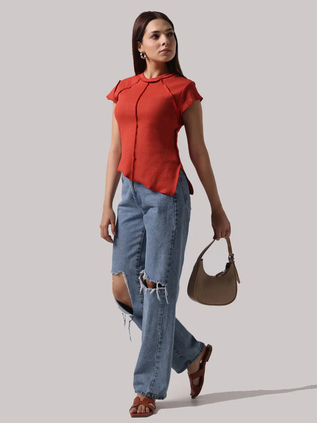 Red cap-sleeve top with exposed seam placket and stand collar
