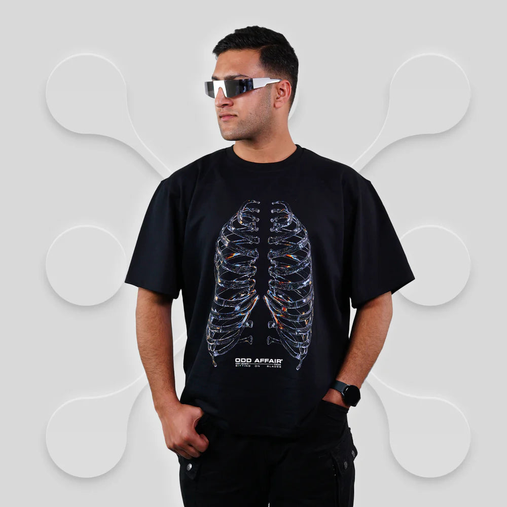 SITTING ON BLADES T-SHIRT
