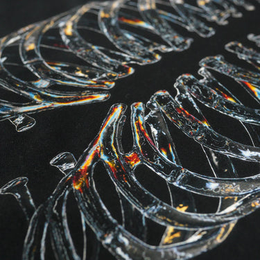SITTING ON BLADES T-SHIRT