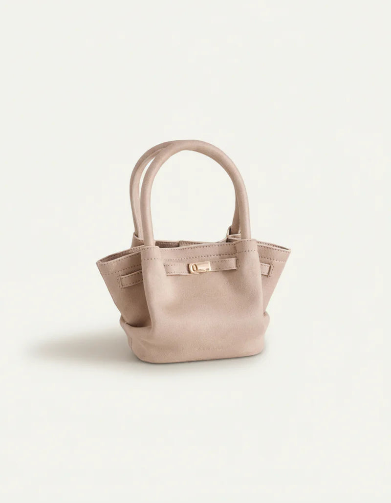 Cream structured tote bag with short handles and front buckle clasp