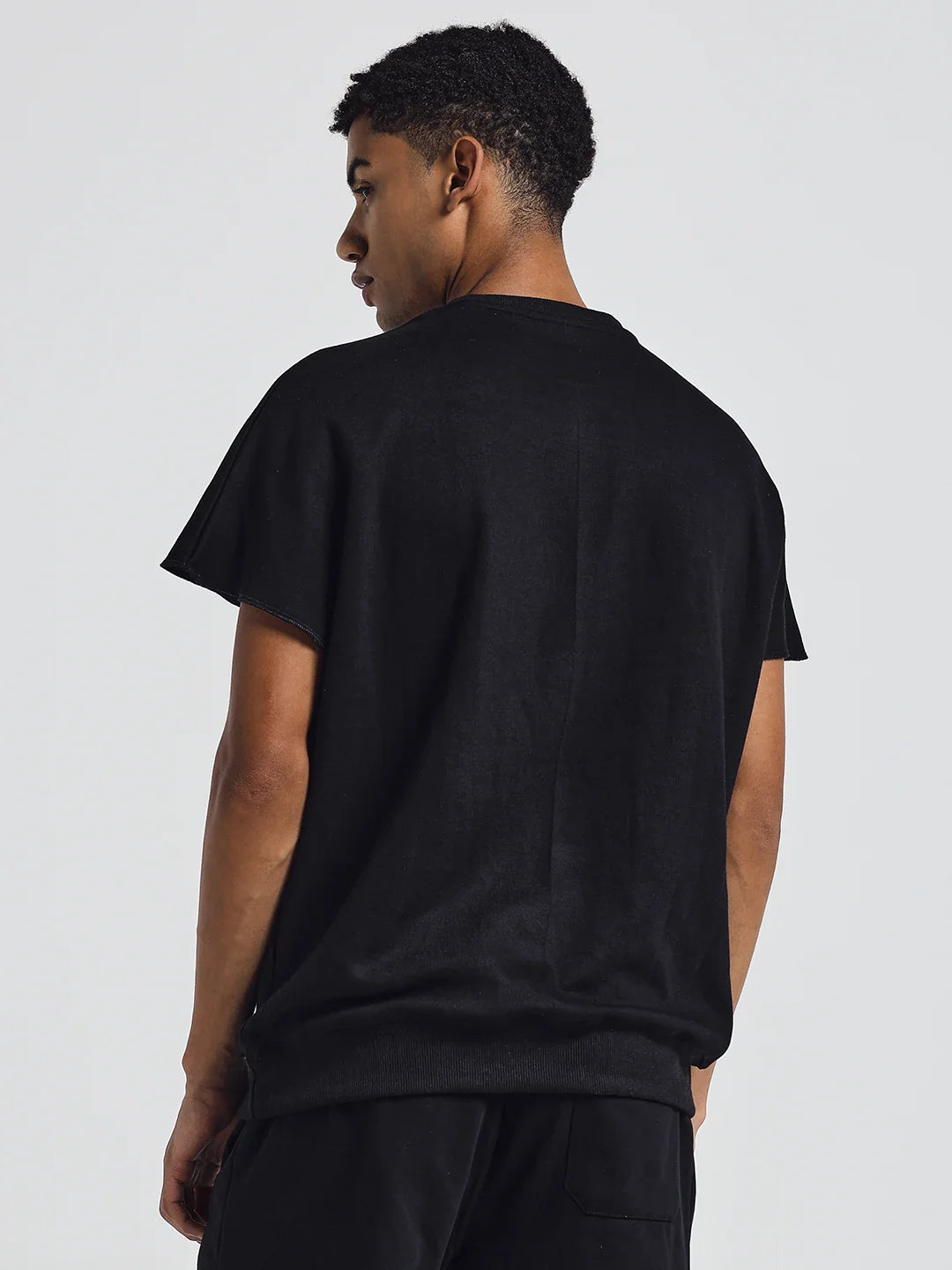 Black crew-neck short-sleeve T-shirt with large DUVRZI front graphic