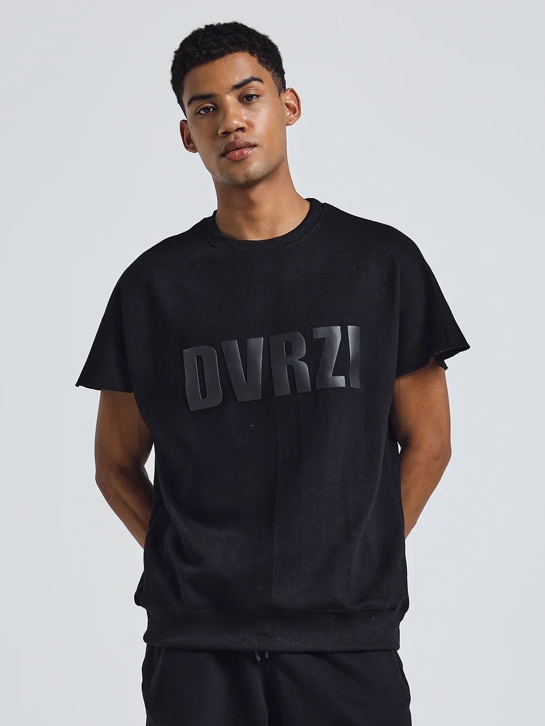 Black crew-neck T-shirt with centered DUVRZI front graphic
