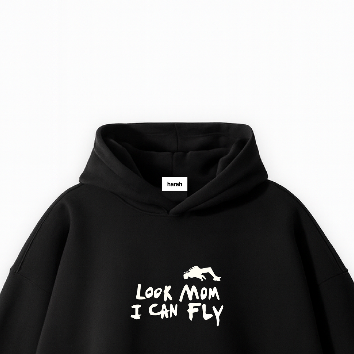 Black pullover hoodie close-up of chest dinosaur graphic with 'Look Mom I Can Fly' text