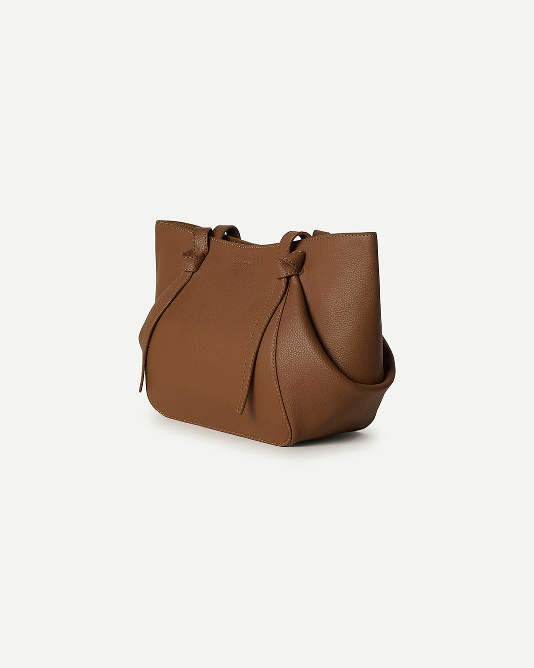 Tan leather drawstring bucket bag with side tassels and short handles