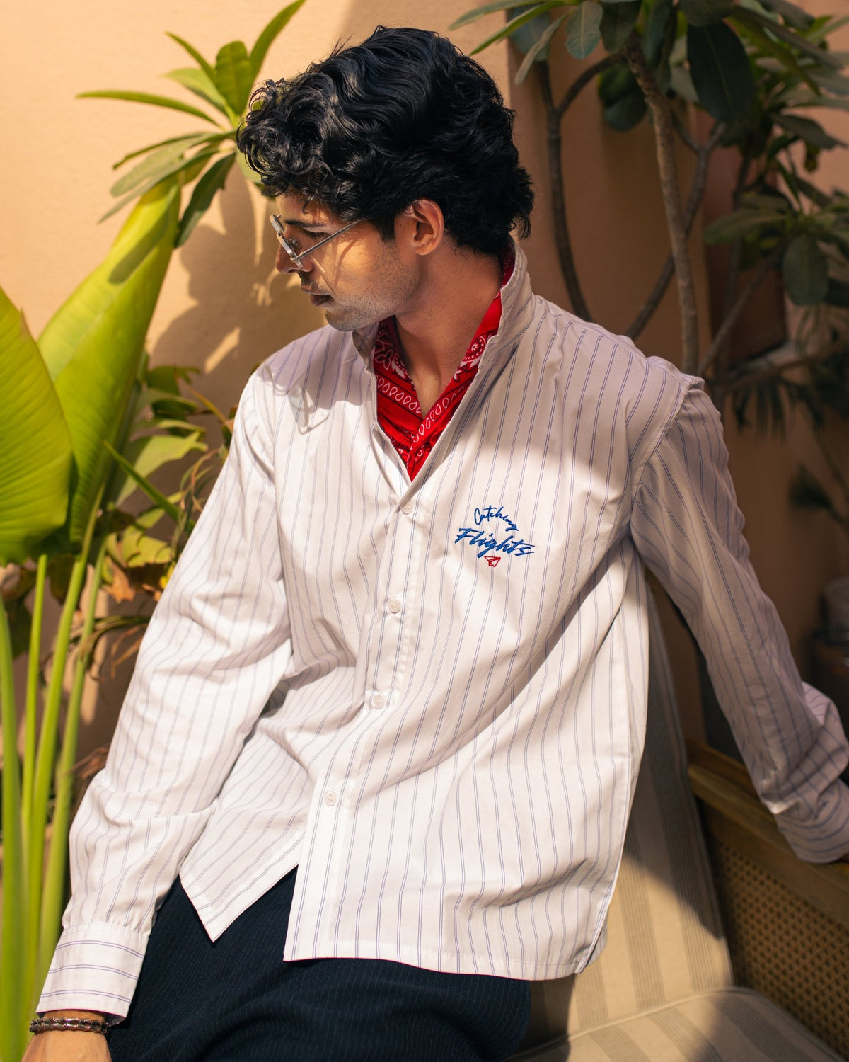 White pinstripe suiting shirt with blue stripes, embroidered chest logo, button-front
