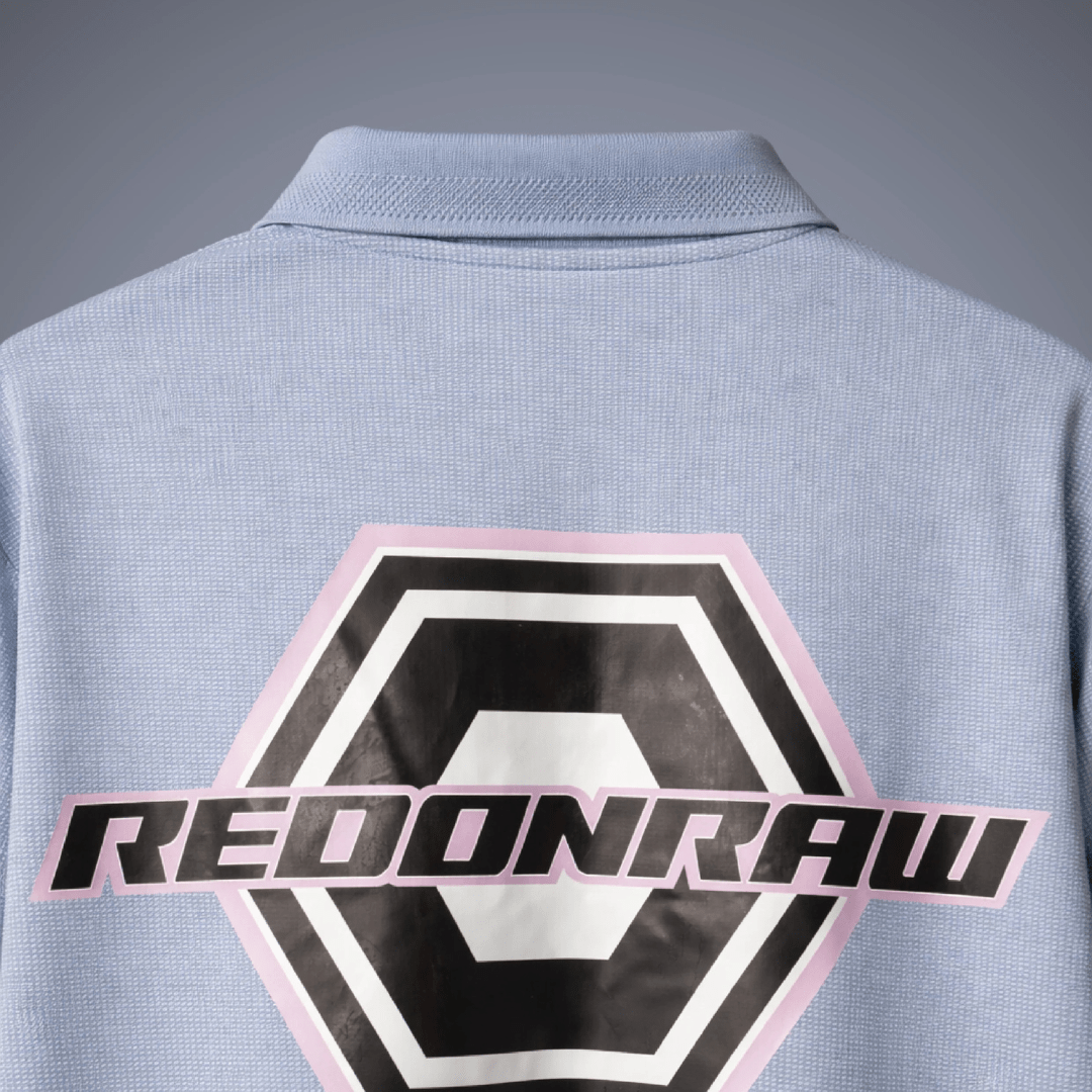 Slate grey polo shirt back with large hex logo and REDONRAW text