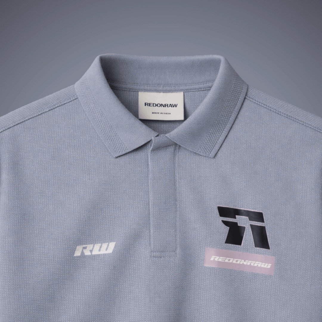Slate grey polo shirt with REDONRAW neck label and front chest logo prints