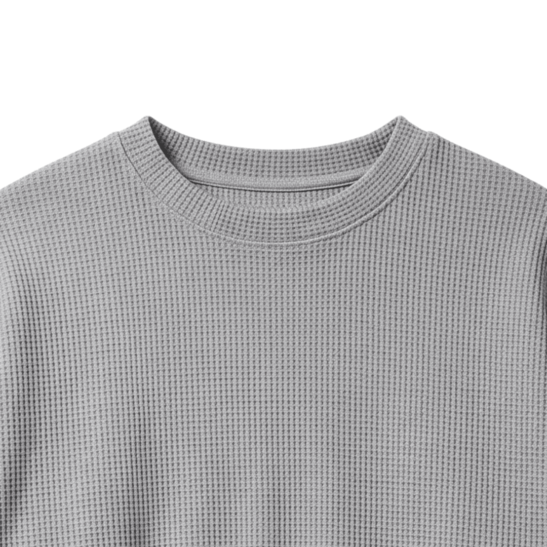 Grey waffle-knit crewneck sweater neckline close-up