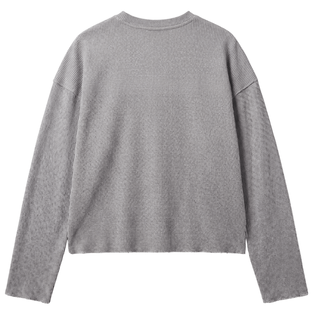 Grey waffle-knit crewneck sweater, long sleeves and ribbed collar
