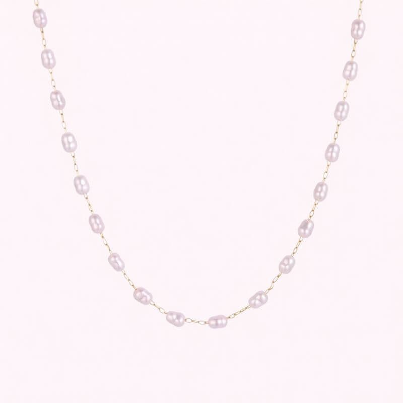 Iridescent pearl necklace with light purple round beads on thin gold-tone chain