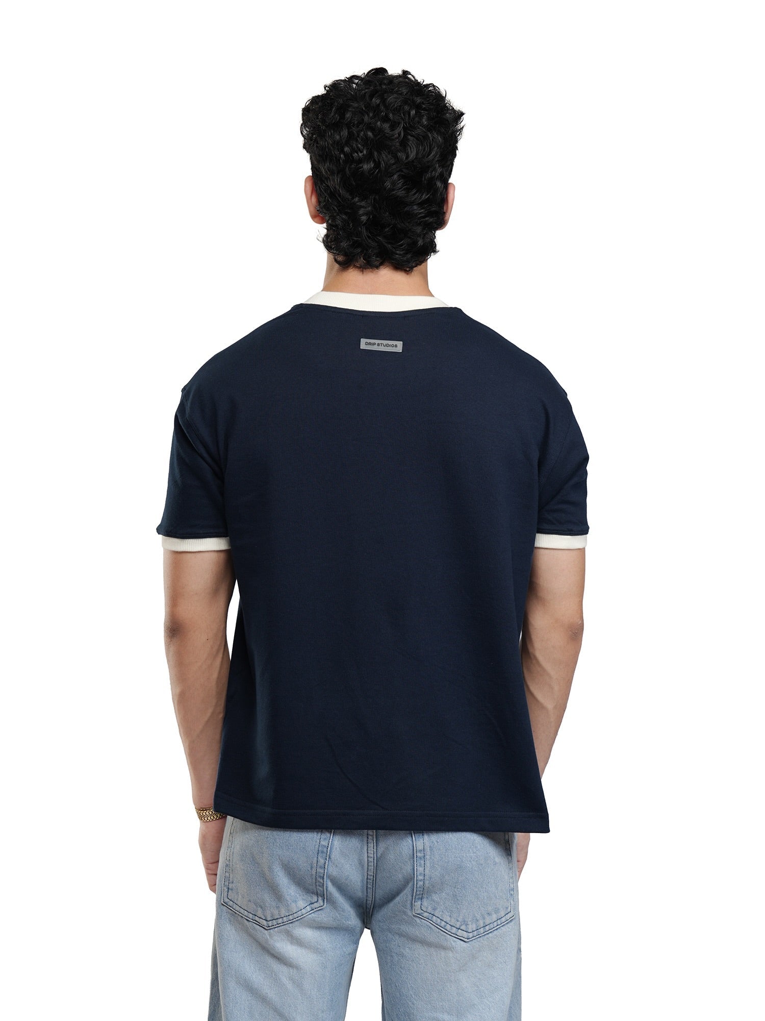 Navy ringer T-shirt, back view with white collar/cuffs and small neck label