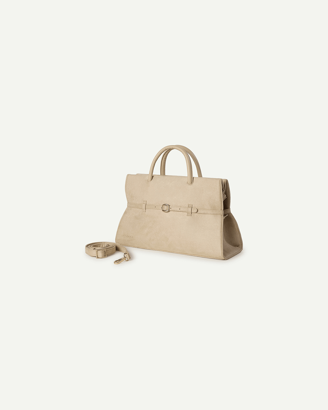 Cream handbag tote with top handles and hanging keychain strap