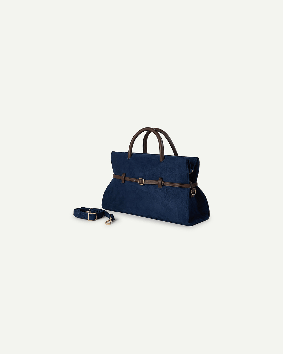 Dark blue tote bag with brown handles, buckle strap, and matching removable strap