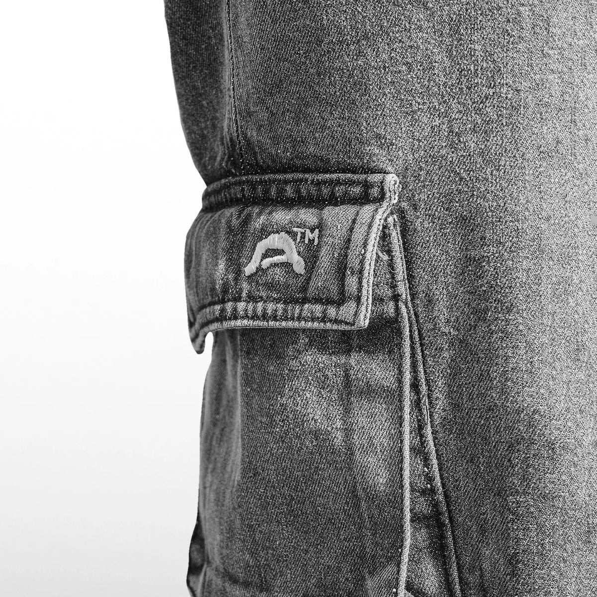 Grey denim cargo pants with elastic cuff and side patch pocket detail