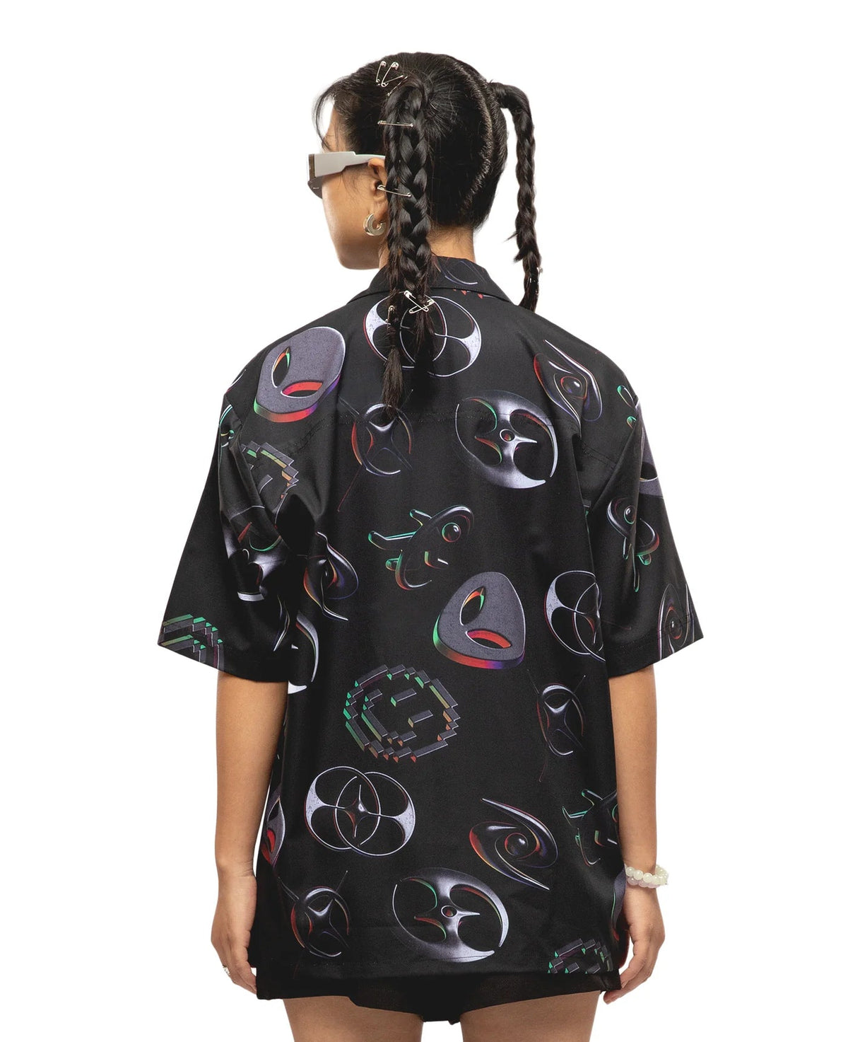 Black graphic short-sleeve shirt with abstract circular icons, back view