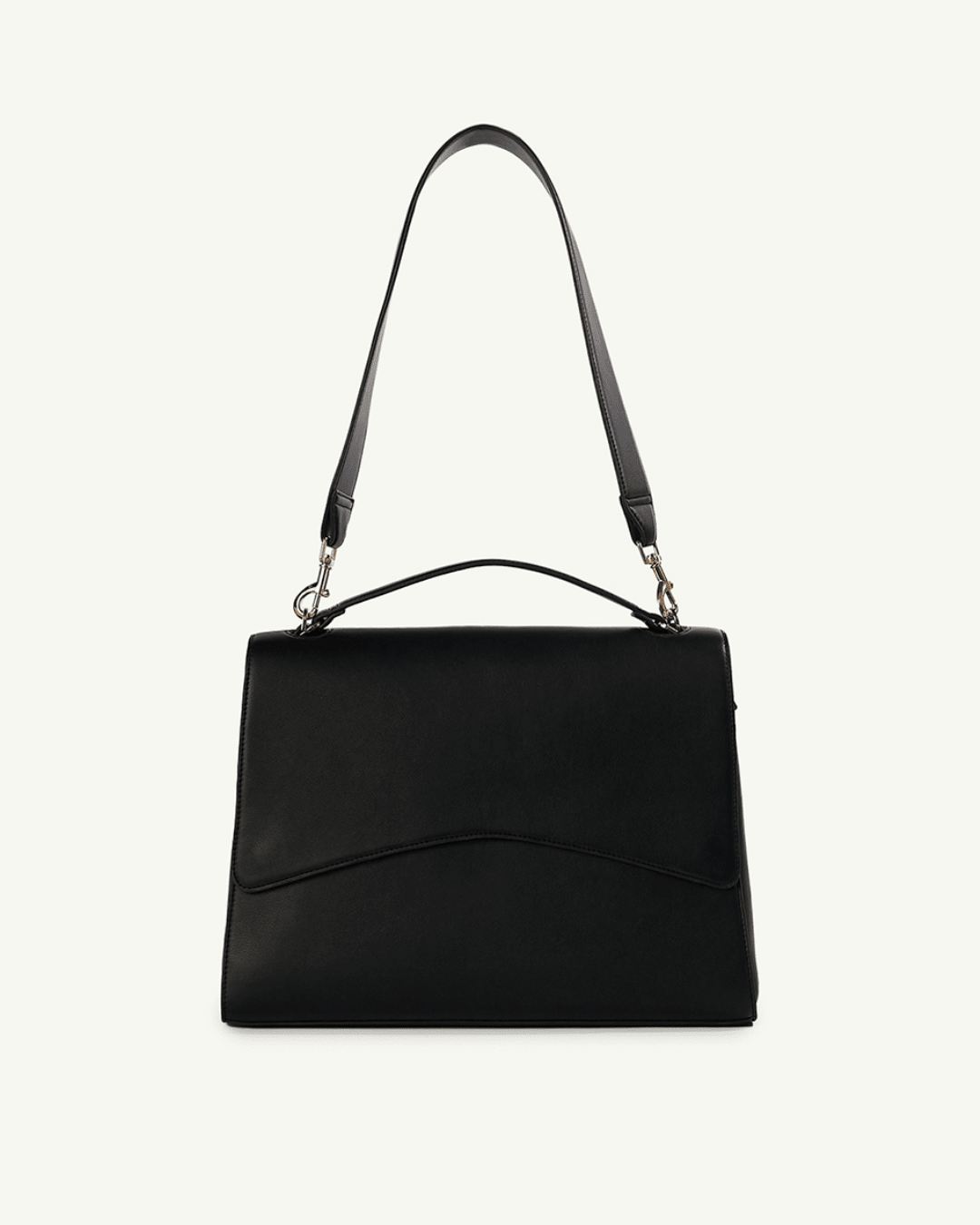Black top-handle handbag with long shoulder strap and front seam