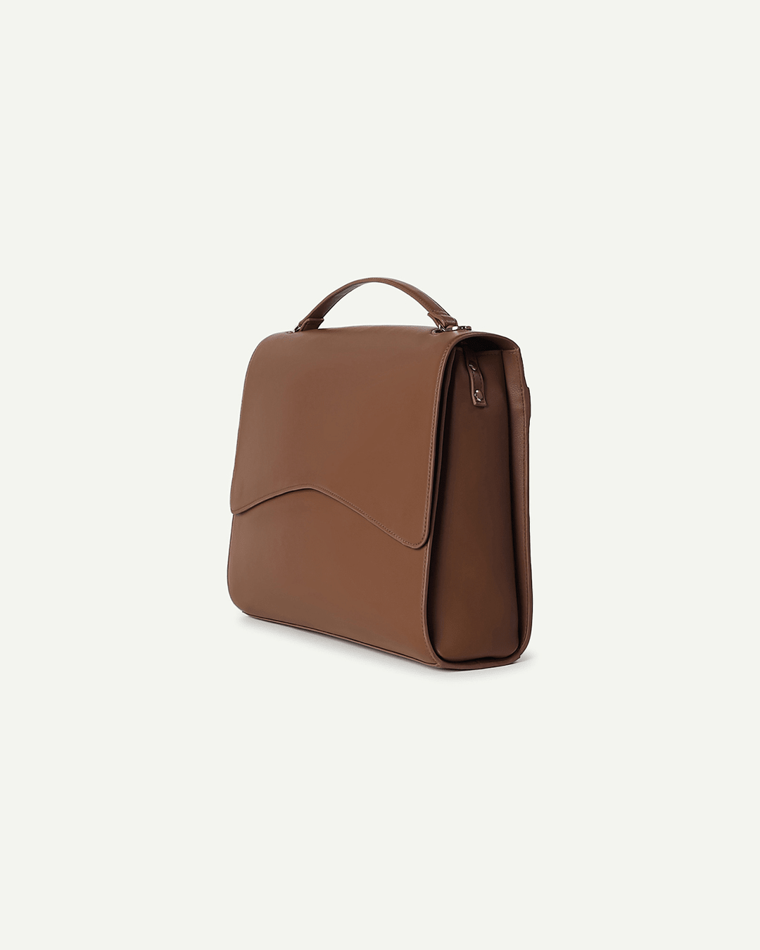 Light brown handbag side view with top handle and front flap