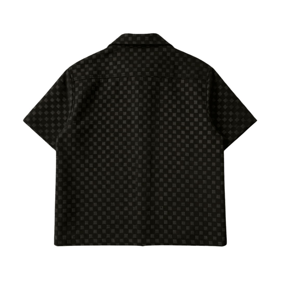 Short-sleeve button-up shirt, dark checkered pattern, back view with pointed collar