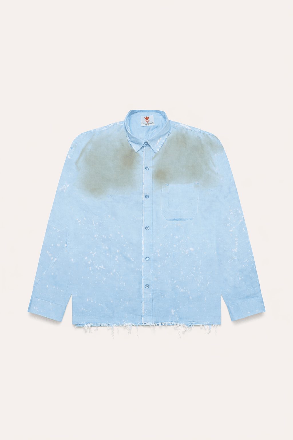 Light blue button-up shirt with speckled distressed stain effect, chest pocket