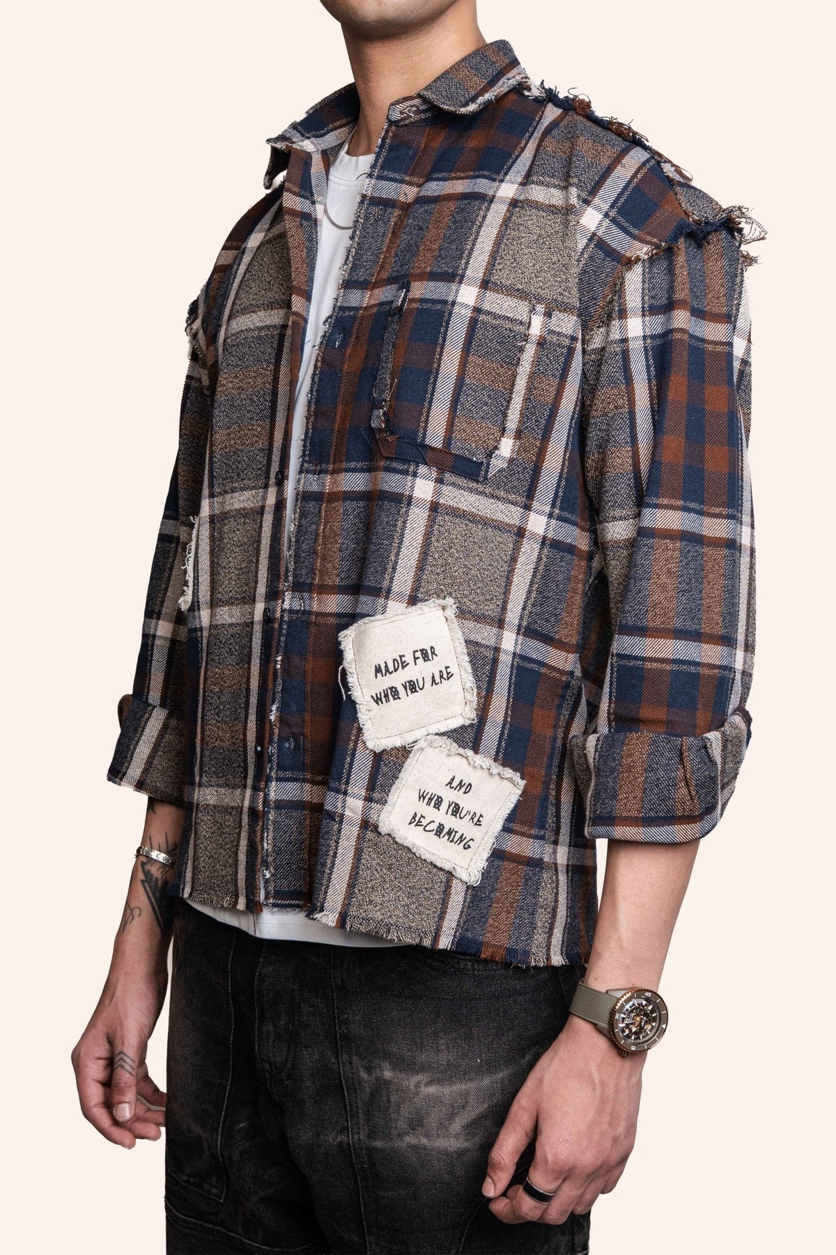 DRO Journey flannel shirt with frayed seams, brown and blue plaid, button front