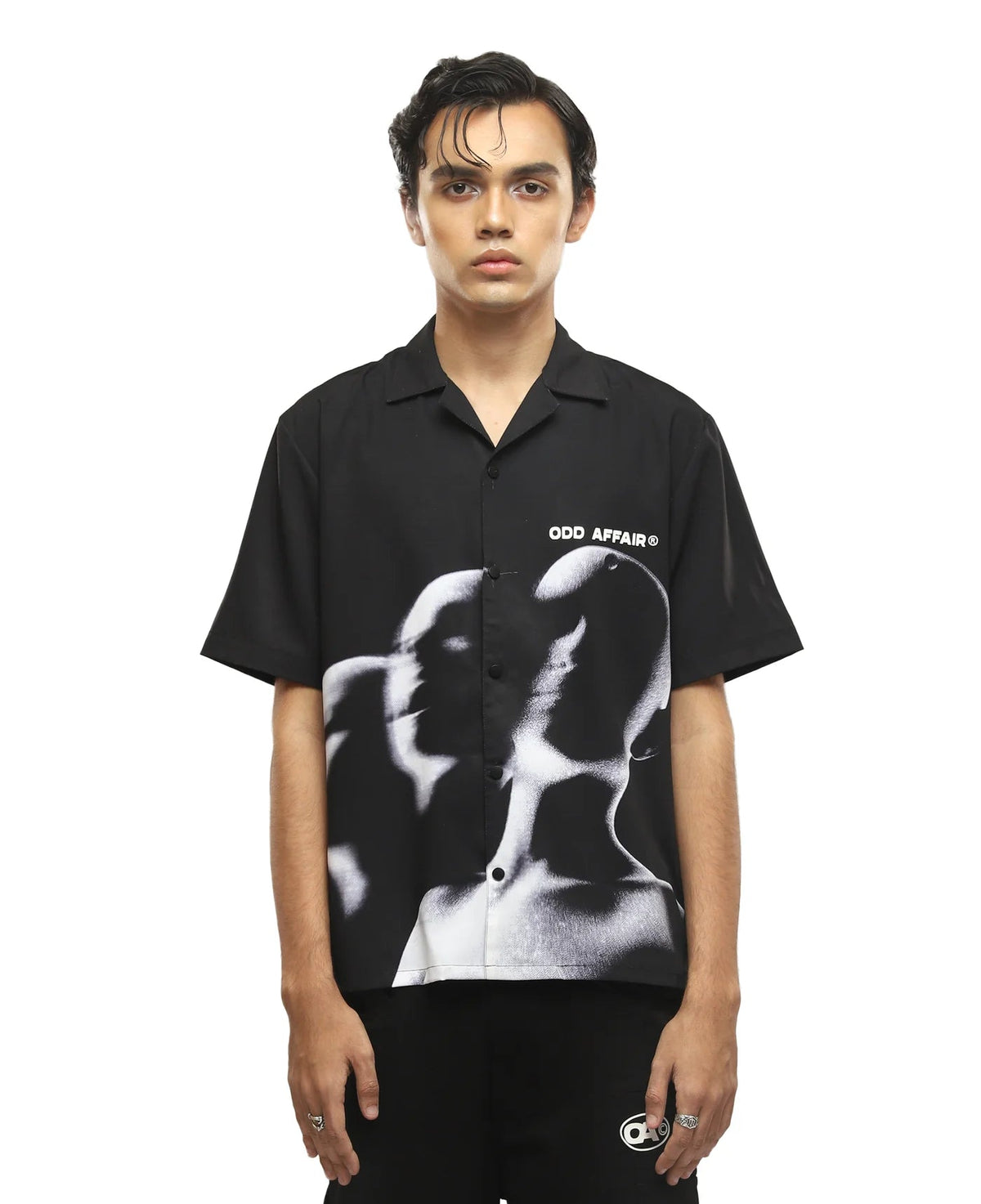 Black short-sleeve button-up shirt with white abstract face graphic and ODD AFFAIR logo