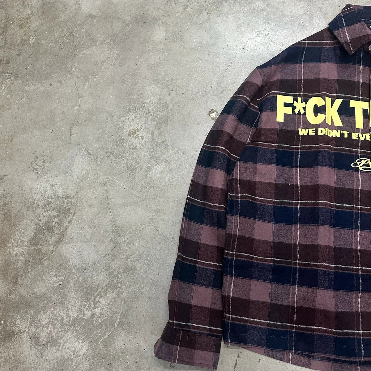 FTW shirt plaid with yellow front slogan graphic and button-up collar