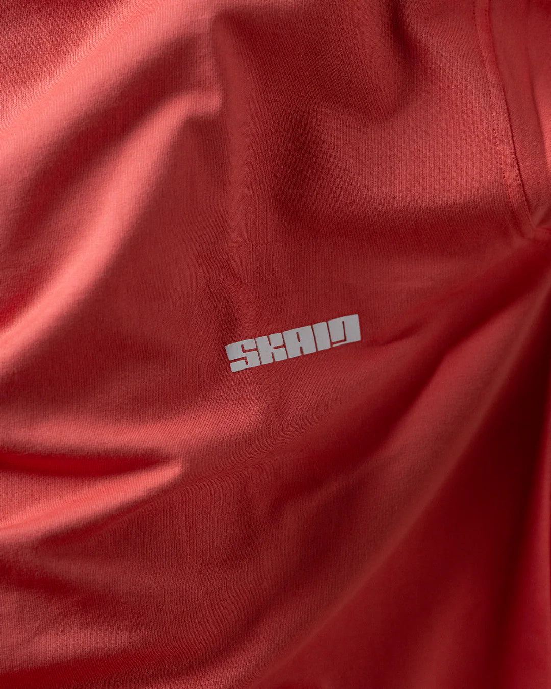 Watermelon coral T-shirt fabric with small chest logo print