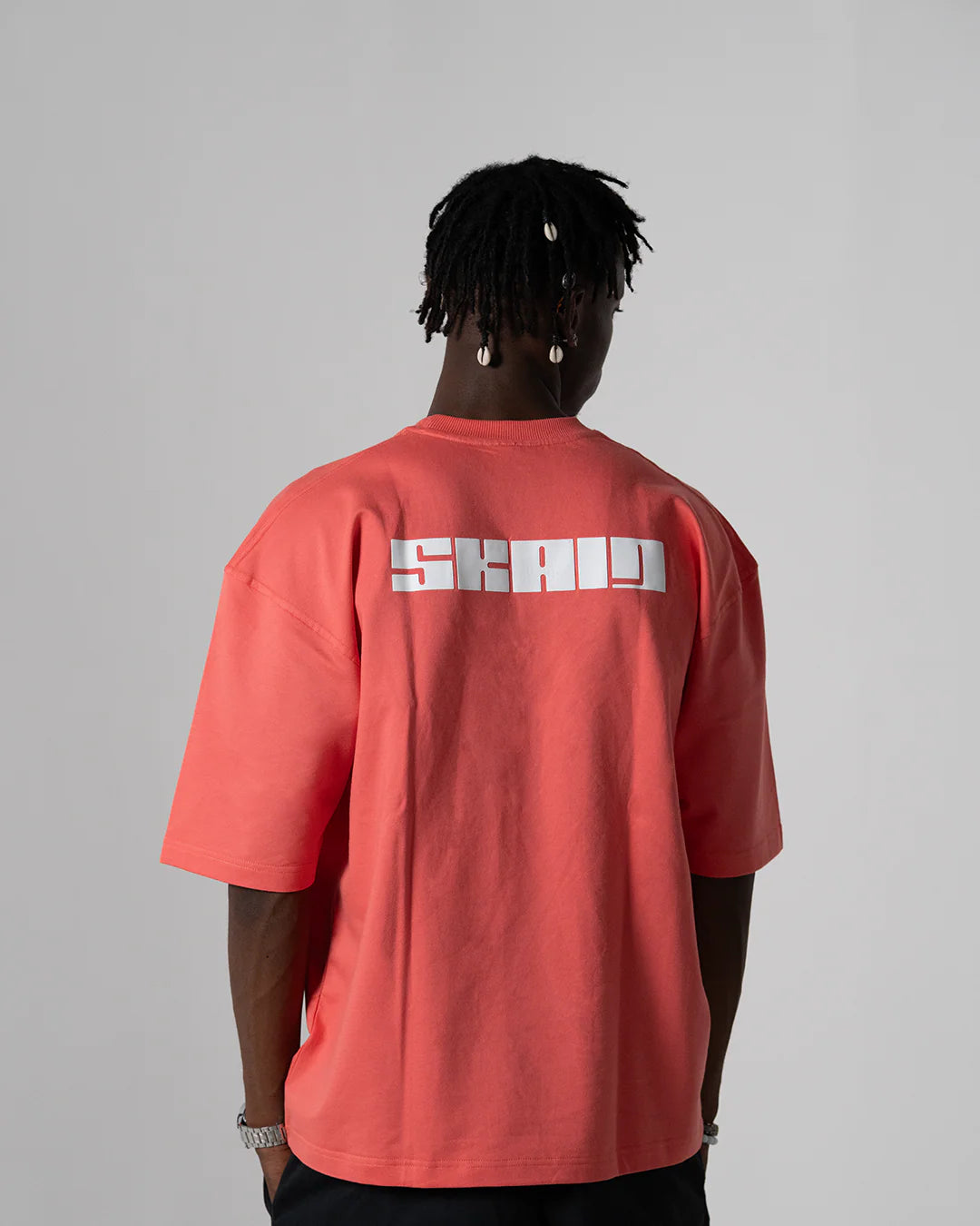 Watermelon coral solid T-shirt with large back logo, crew neck, short sleeves