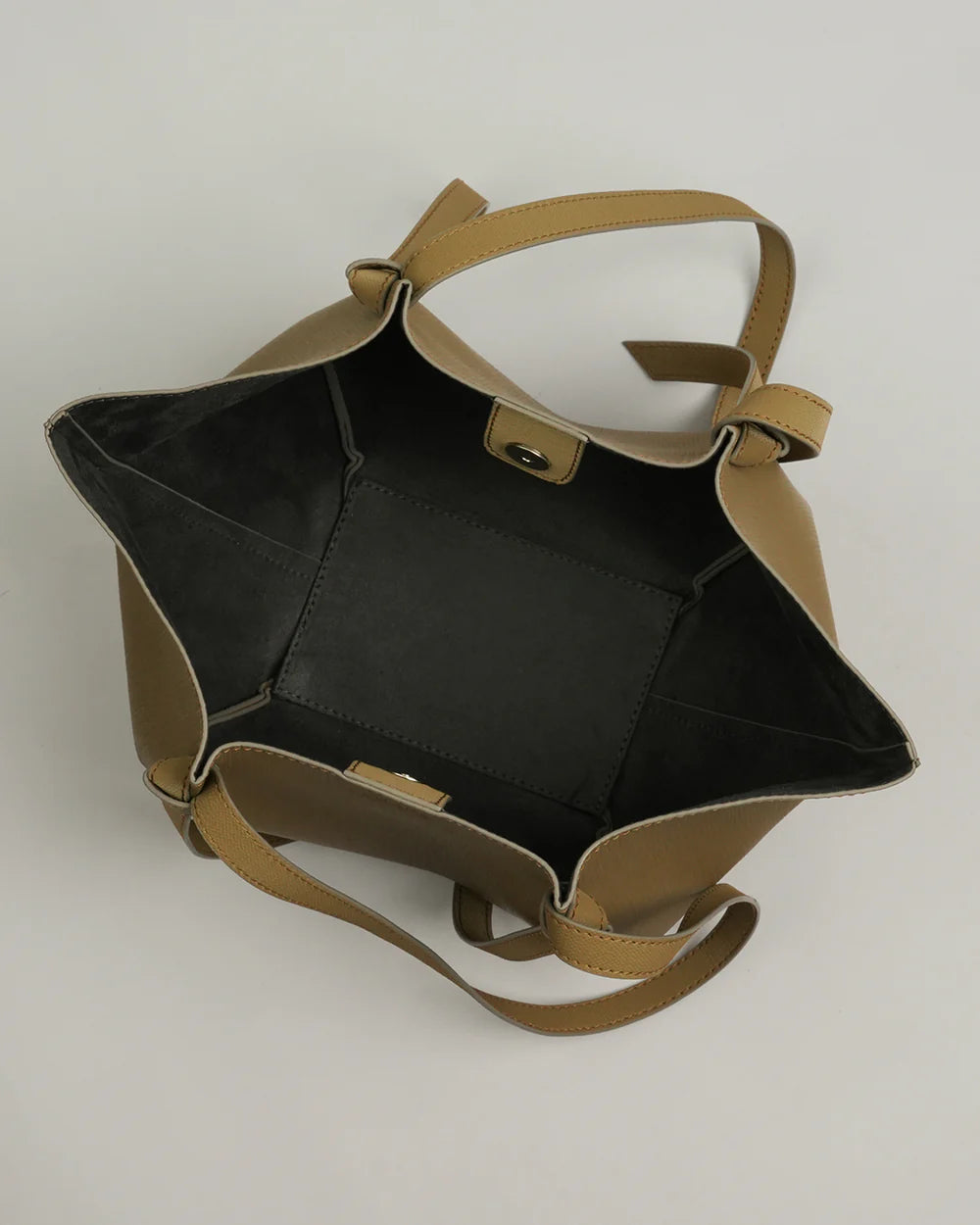 Olive tote bag open top with dark lining, adjustable shoulder strap and metal buckle