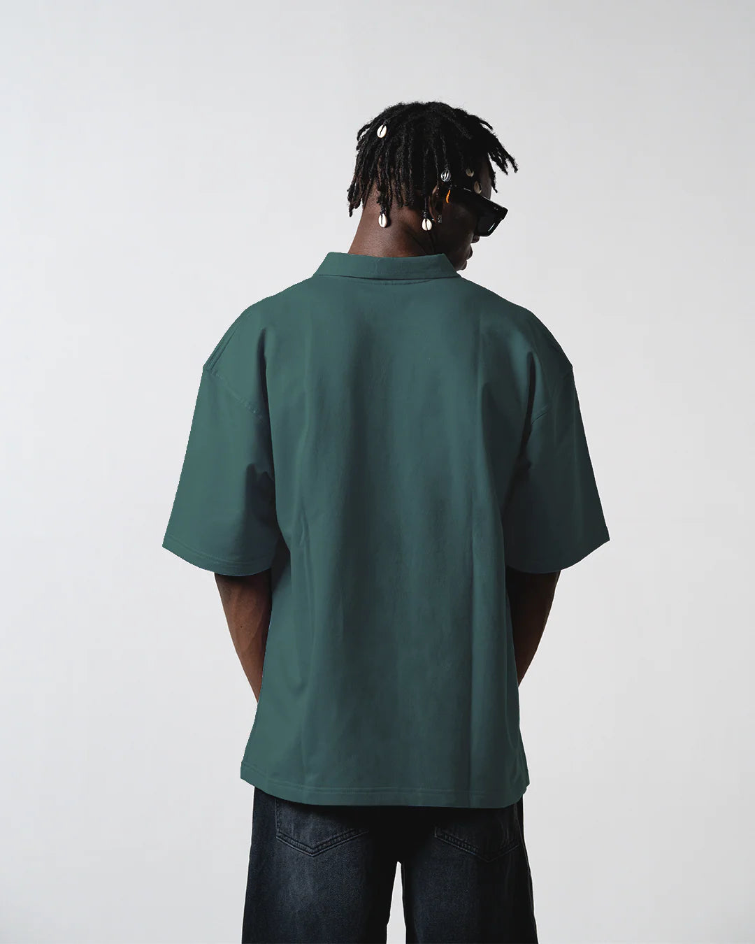 Forest green polo shirt, back view with short sleeves