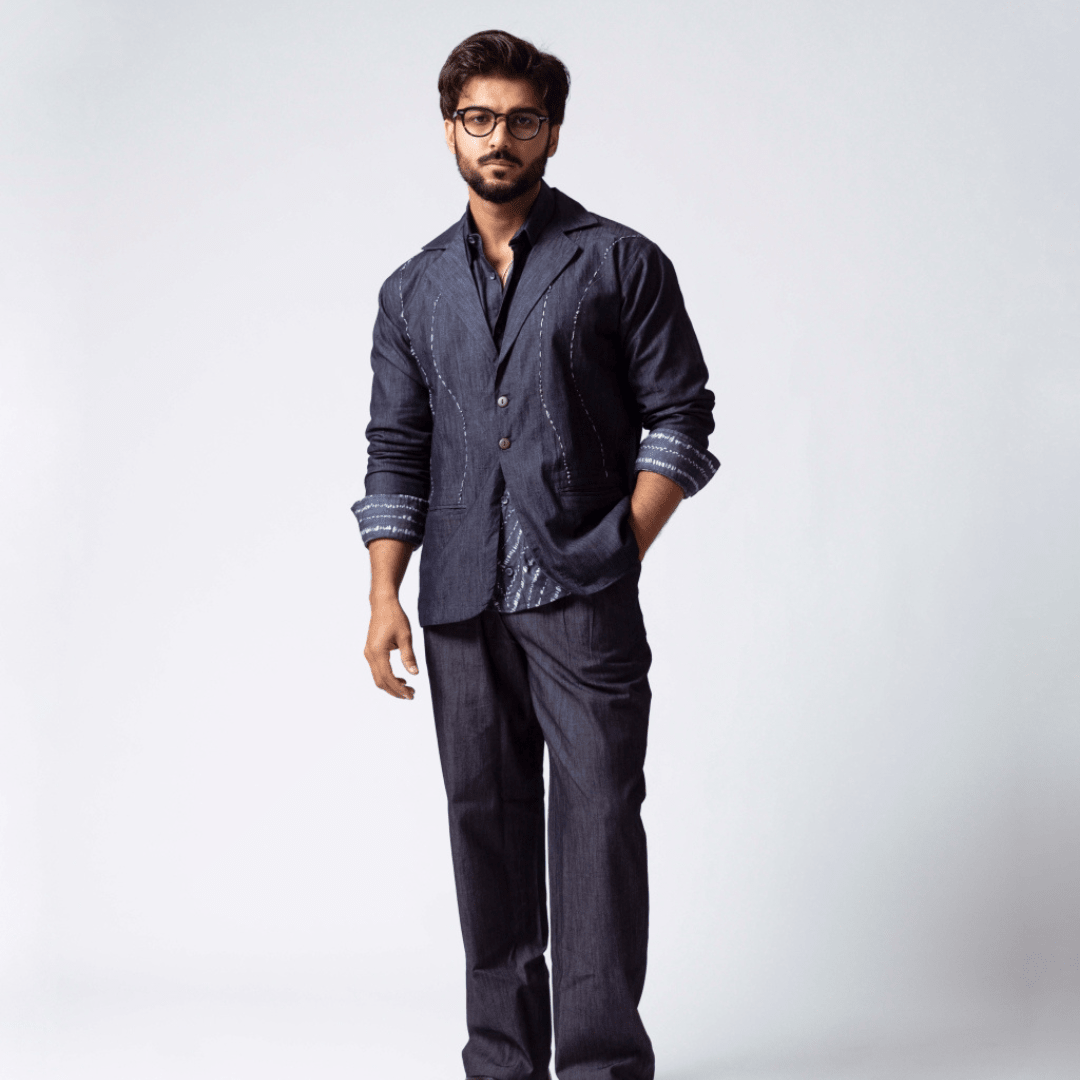 Indigo blazer and trousers set, button-front blazer and matching indigo pants, front view