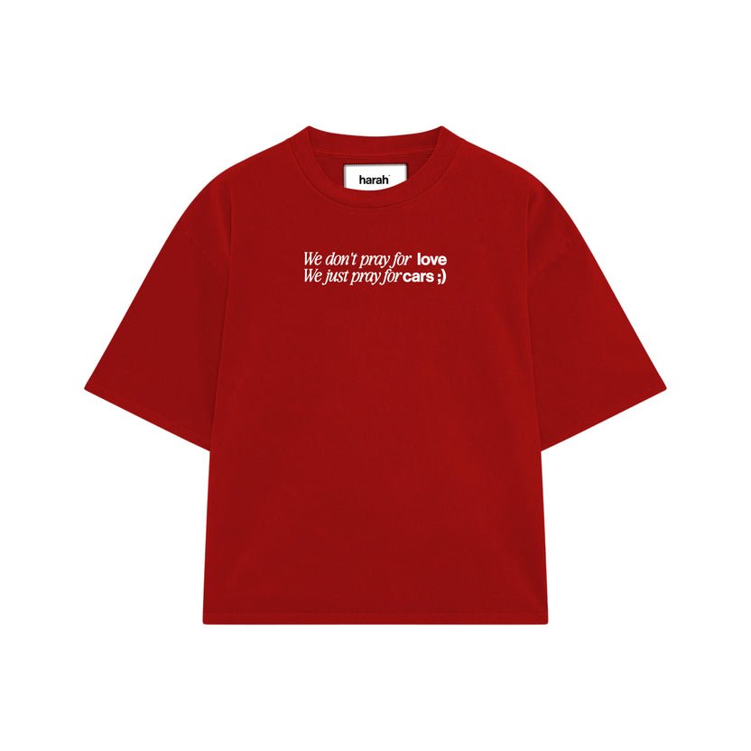 Red crewneck short-sleeve graphic tee with small chest text print