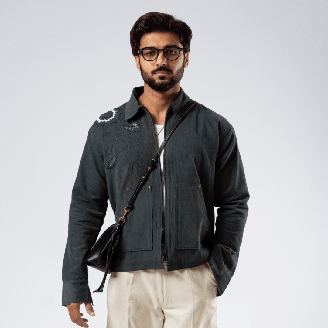 Dark green field jacket with front zip and flap pockets