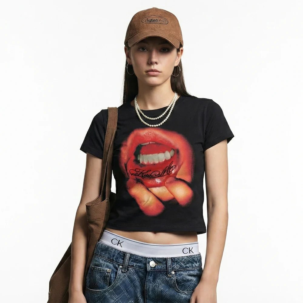 Black cropped baby tee worn by model, red lips graphic front
