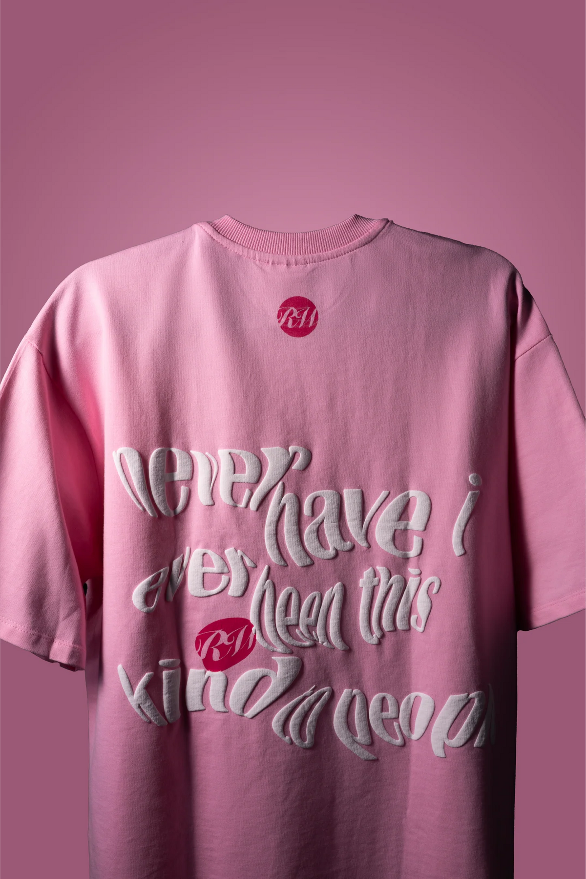 Baby pink T-shirt with layered never-have-i front graphic text
