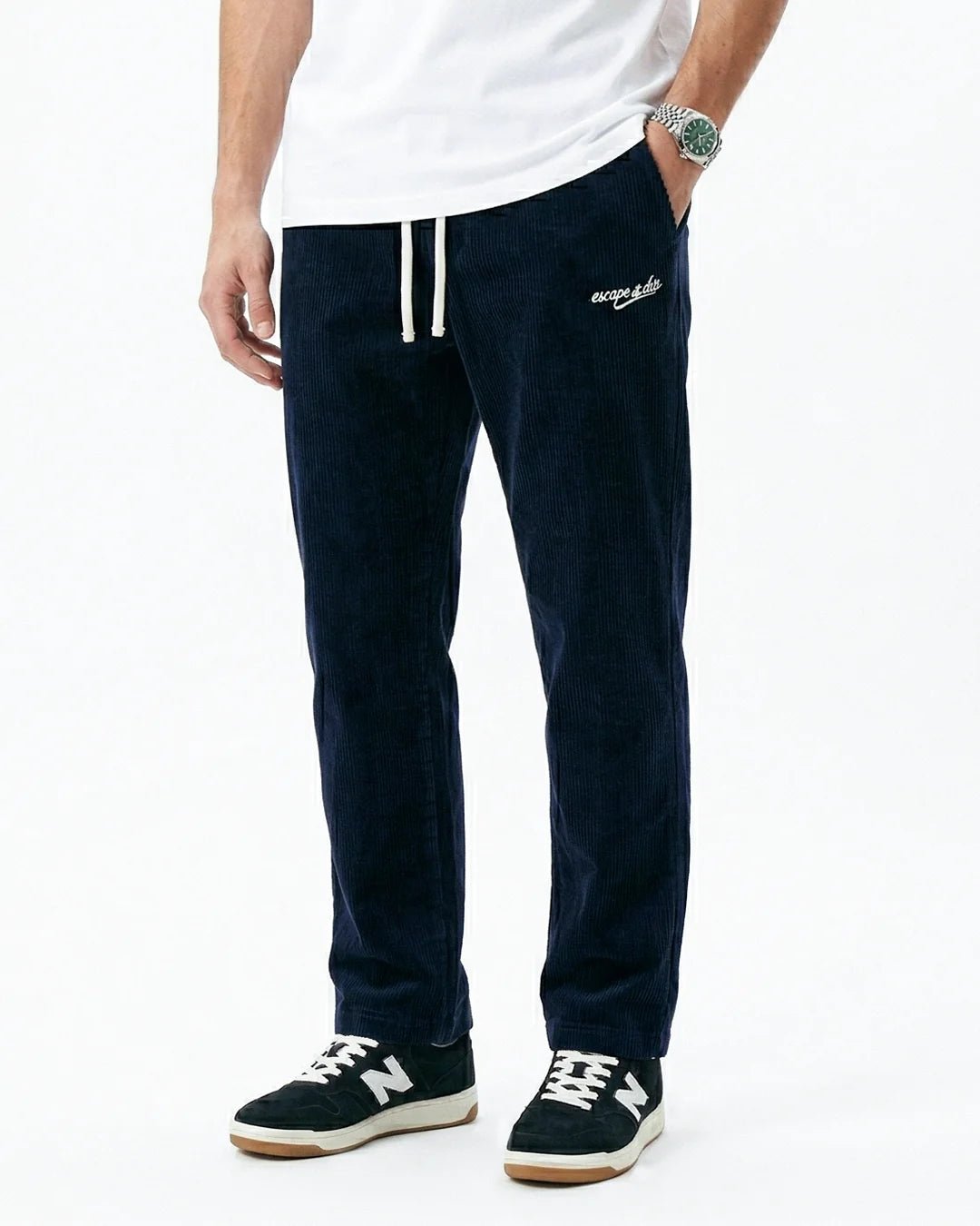 Navy corduroy sweatpants with side logo and white drawstring