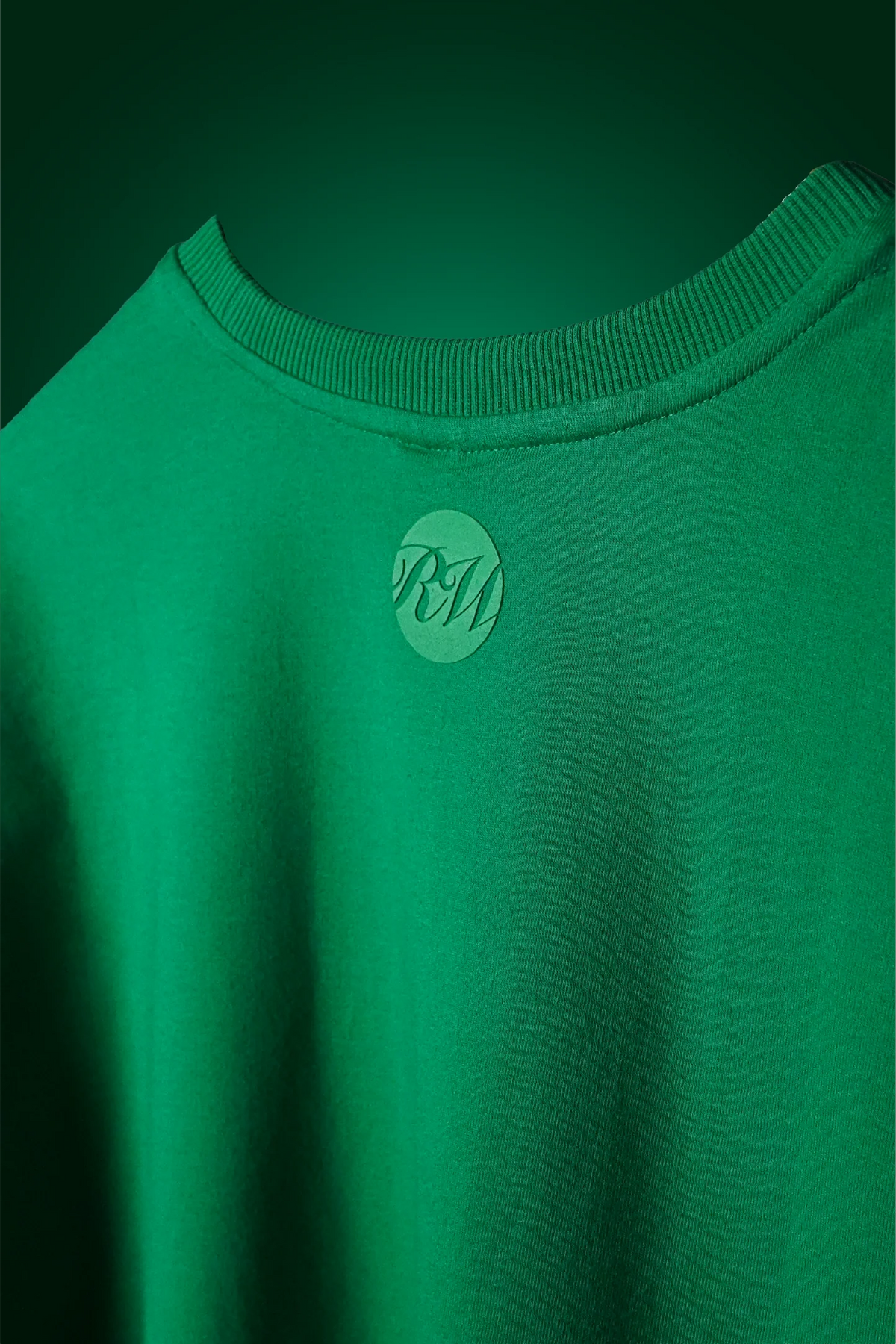 Lime green crewneck T-shirt with circular RW emblem
