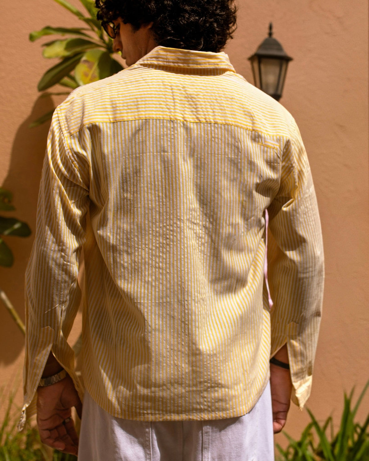 Yellow vertical-striped seersucker shirt, back view with yoke and chest pocket