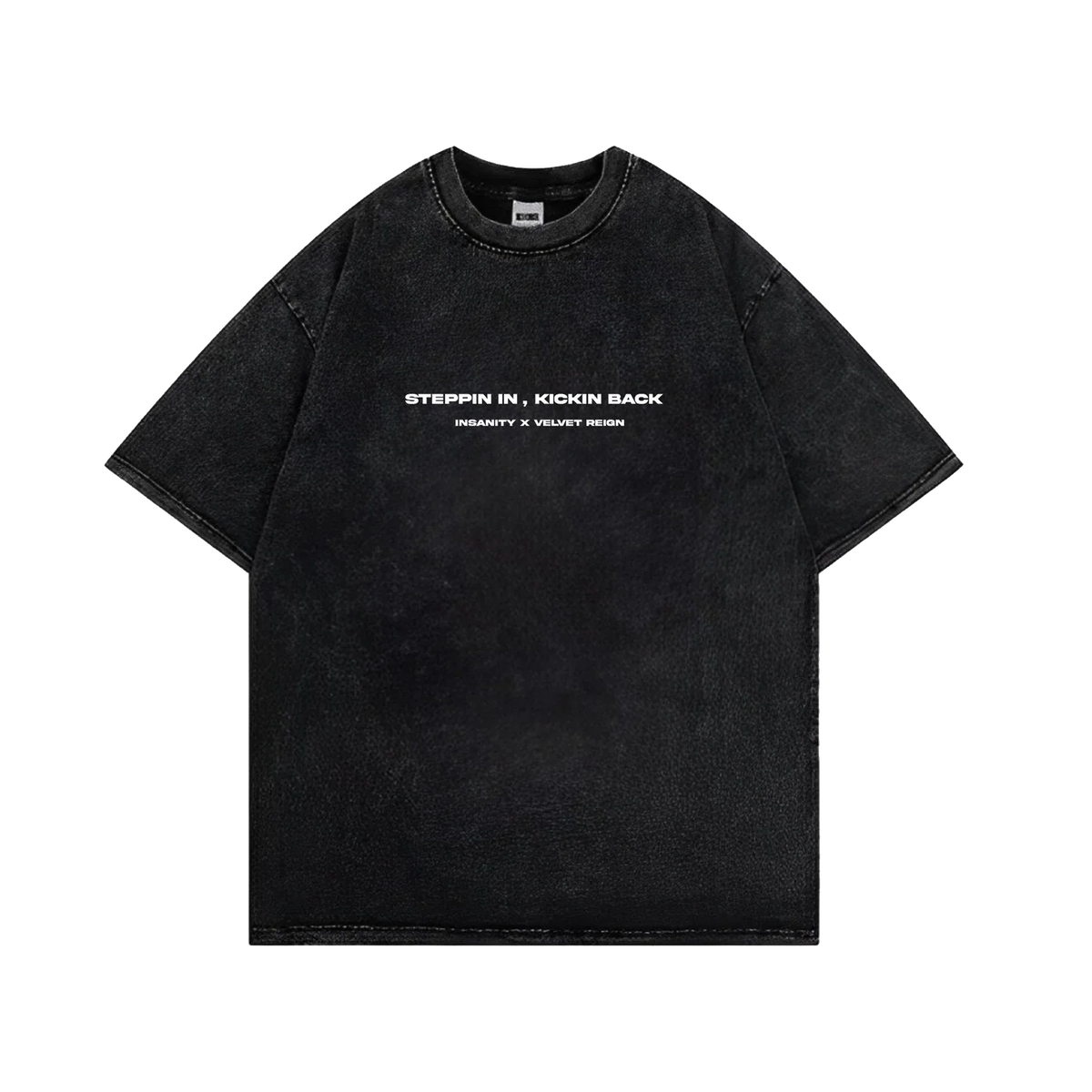 Black crew-neck T-shirt with small "Steppin in, Kickin back" logo text