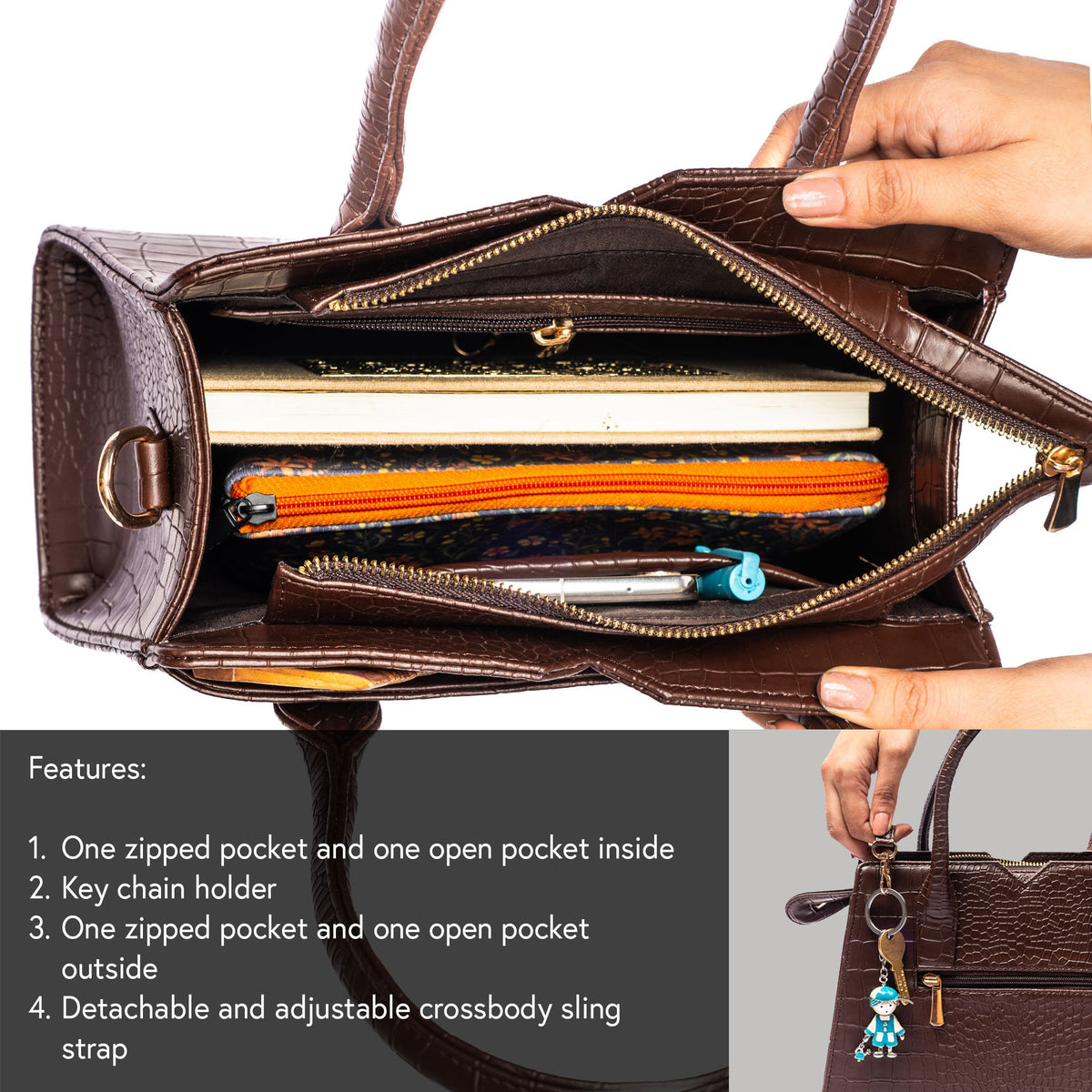 Open mahogany croc-embossed handbag showing zipper top and interior pockets.
