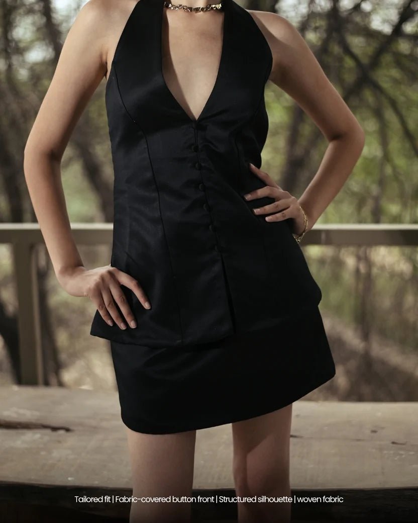 Black halter satin mini dress with button front and gathered bust