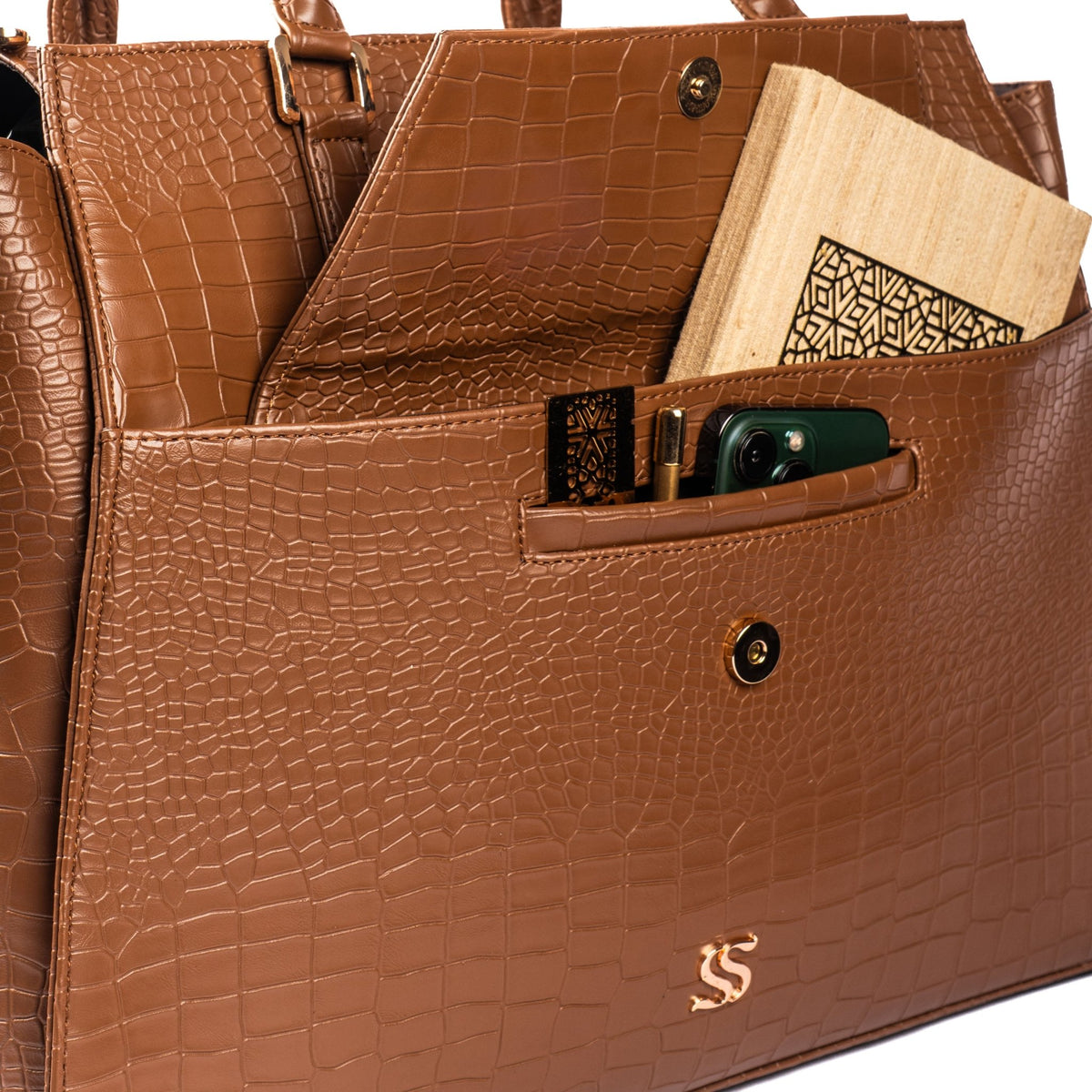Open brown croc-texture tote showing interior pocket and phone slot