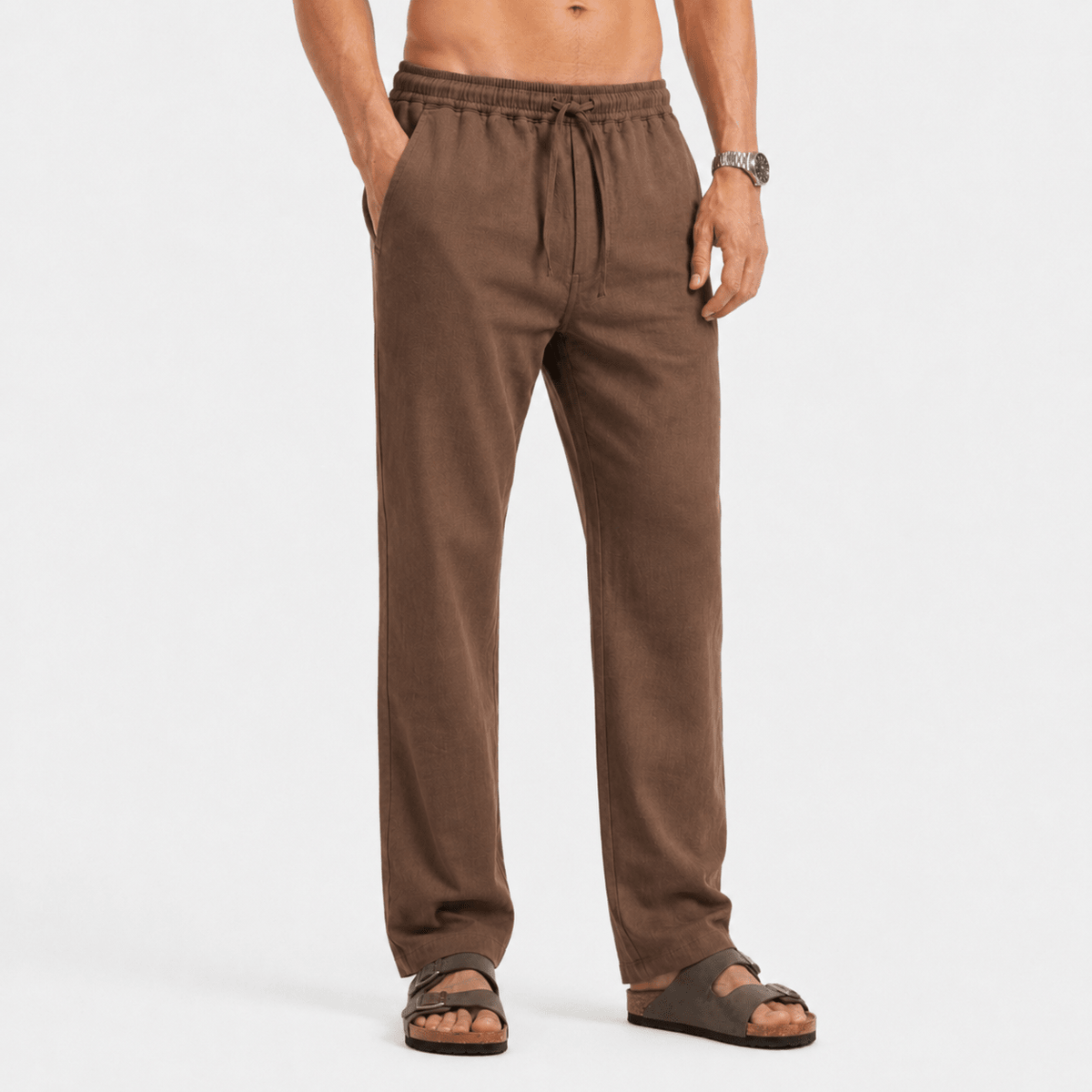 Men's mocha-brown linen pull-on pants, close-up of legs and drawstring waist