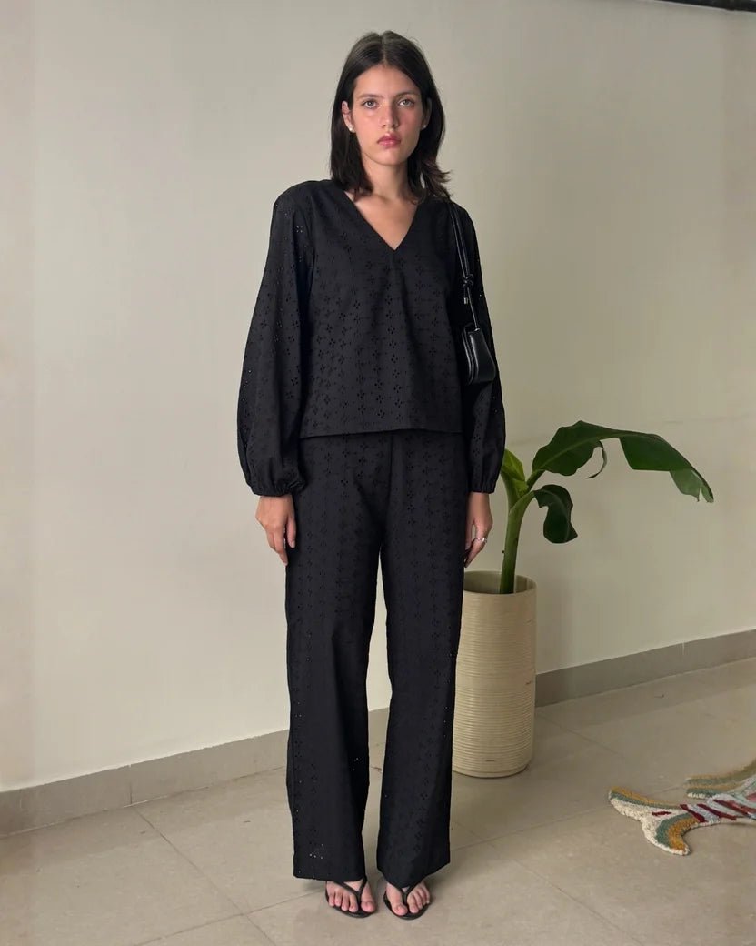 Women's black broderie co-ord set with V-neck blouse and wide-leg trousers, full length