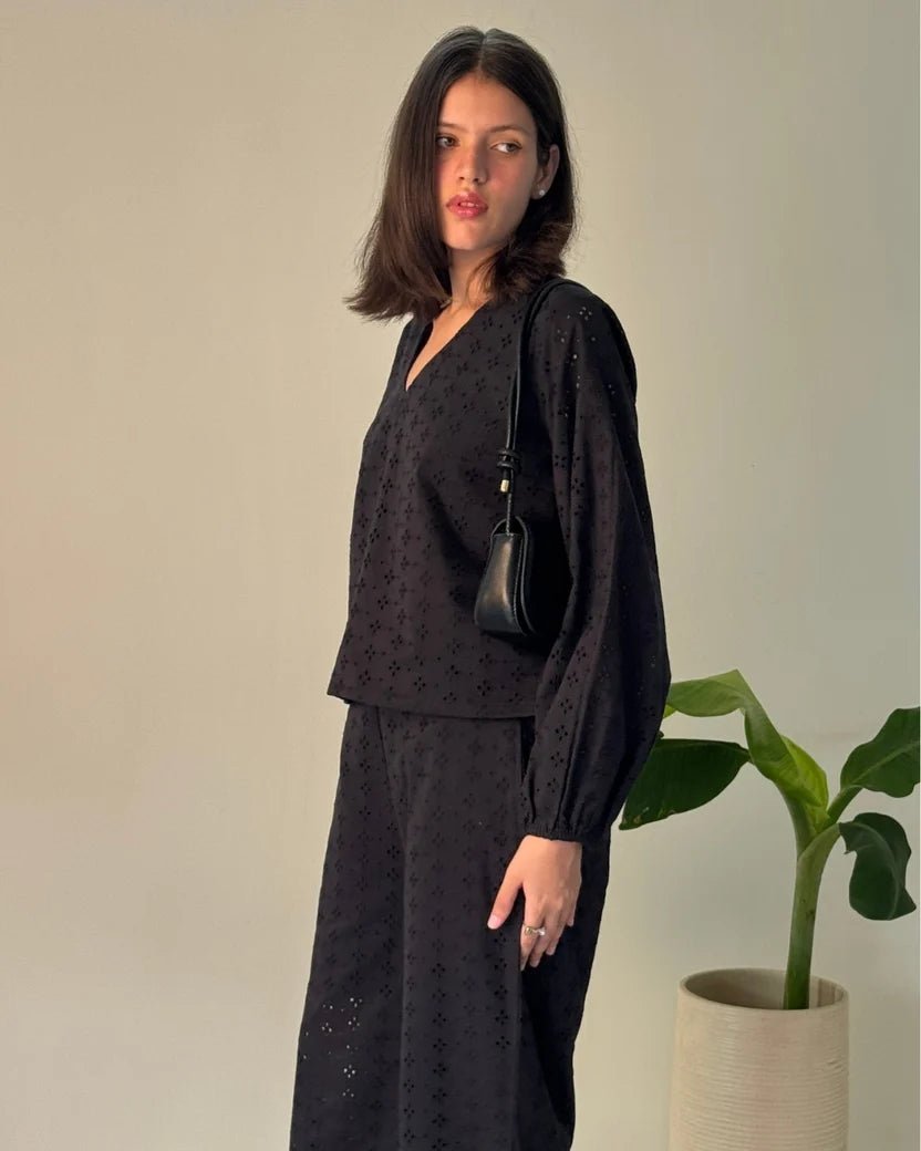 Women's black broderie co-ord set with V-neck blouse and wide-leg trousers