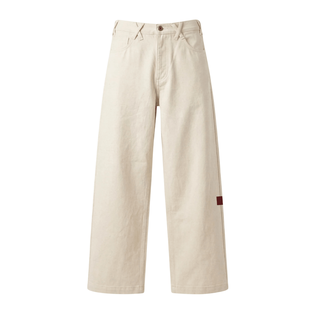 Cream straight wide-leg jeans with button front, belt loops, and patch pockets