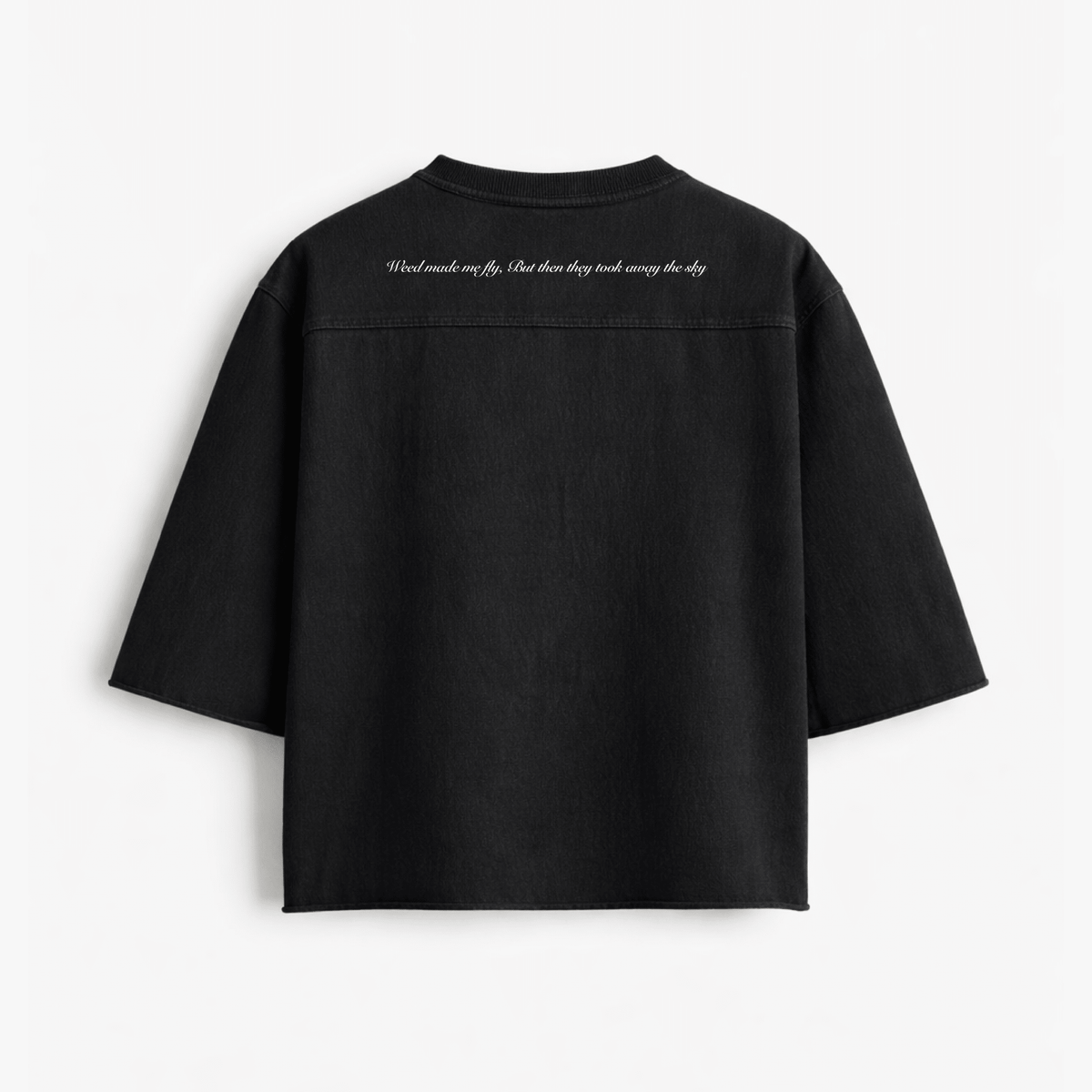 Black oversized boxy rugged T-shirt with short sleeves and back quote text