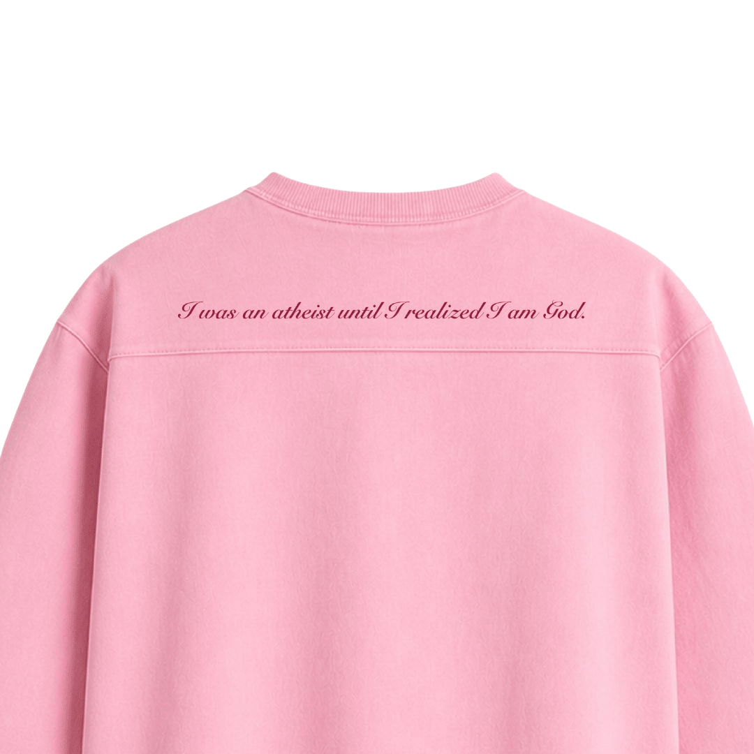 Pink oversized boxy rugged t-shirt with back scripture: 'I was an atheist until I am God.'