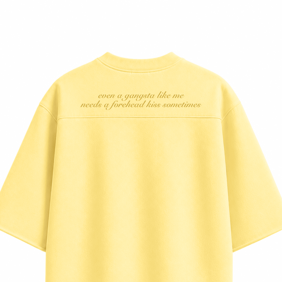 Yellow oversized boxy T-shirt, crew neck, short sleeves, back slogan graphic text
