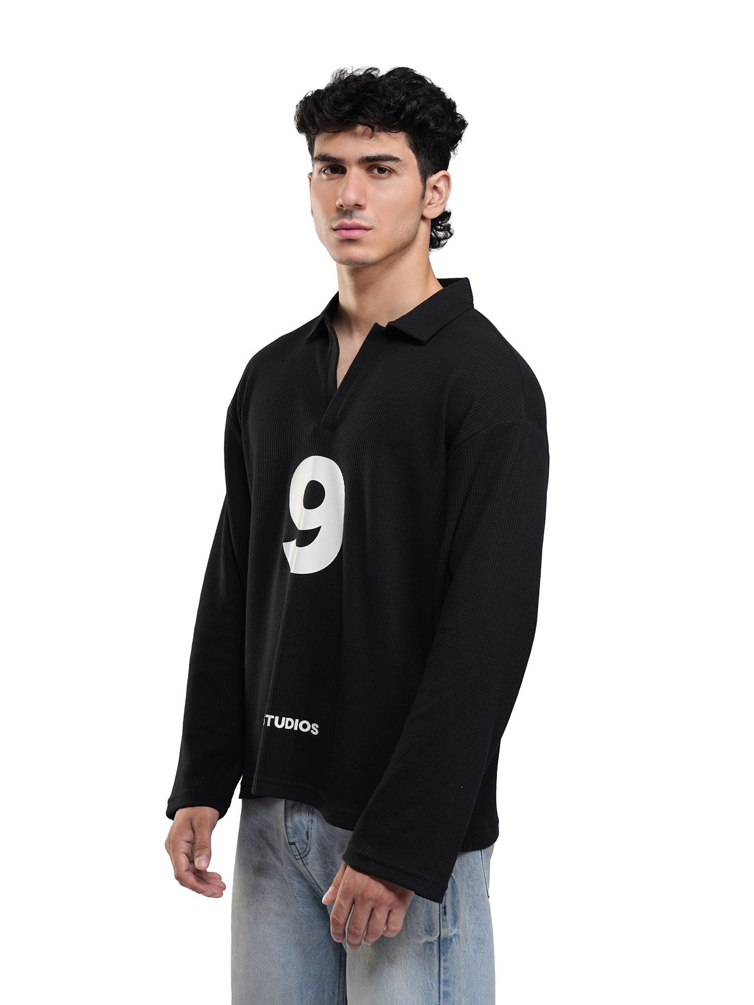 Black long-sleeve polo shirt with white '9' chest graphic and small 'DRIPSTUDIOS'